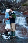 image of kissing at waterfall