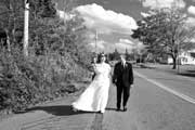 image of wedding couple walking to photo shoot