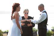 image of bride and groom exchanging rings