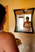 image of bride looking in mirror