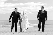 Image of wedding party walking 